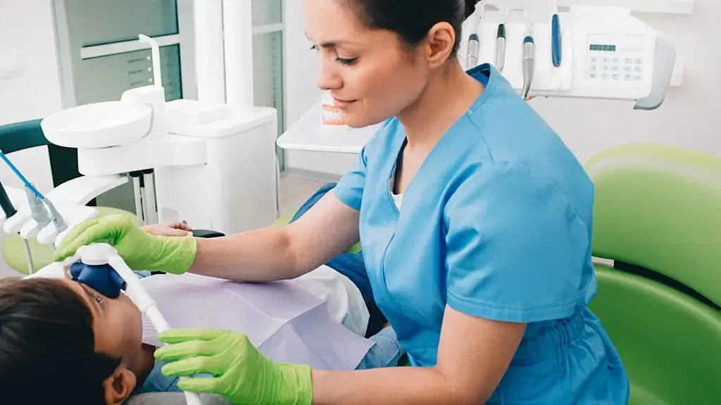 Nitrous Oxide sedation in kid on dental chair